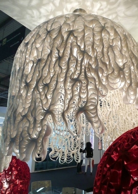 lighting with a lacy felt lamp shade that is shaped like a jelly fish